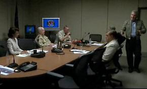 Josh Brolin as George W. Bush discusses the Iraq war with advisers and Pentagon brass