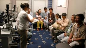 A packed room waiting for health care