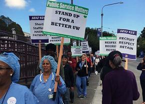 Workers at the University of Washington picket for a fair contract
